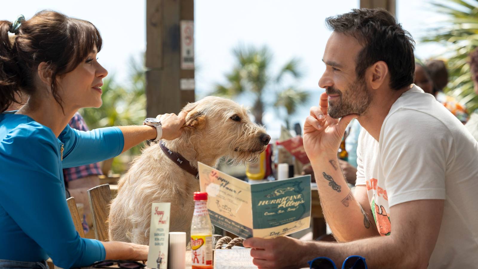 Sparks Fly Between Charlie Cox and Zooey Deschanel In a Brand-New Image From ‘Merv’ [Exclusive]